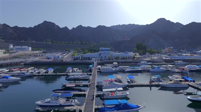 Aerial View of Marina Bandar Al Rowdha Muscat Oman with Yachts and Hajar Mountains