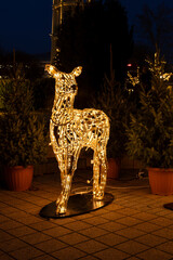 christmas reindeer lights outdoor decoration close-up vertical composition © Sarolta Nagy