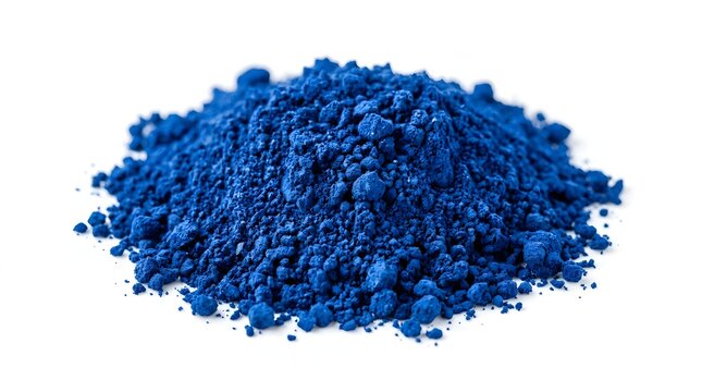 A pile of vivid blue spirulina powder on a plain white background.