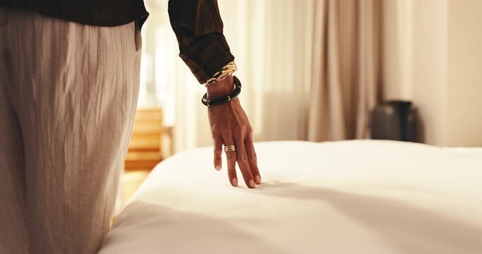 Hands, woman and touch bedsheet in hotel room for fabric quality, check cleanliness and holiday. Guest, person and duvet inspection at lodge for bed comfort, hygiene standard and vacation getaway