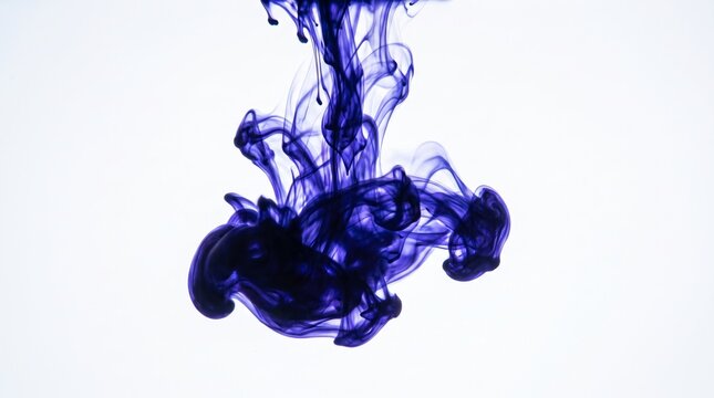 Blue ink swirling, flowing through water on white background