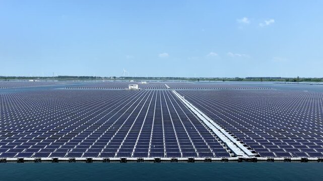 Floating solar photovoltaic panel array on water surface