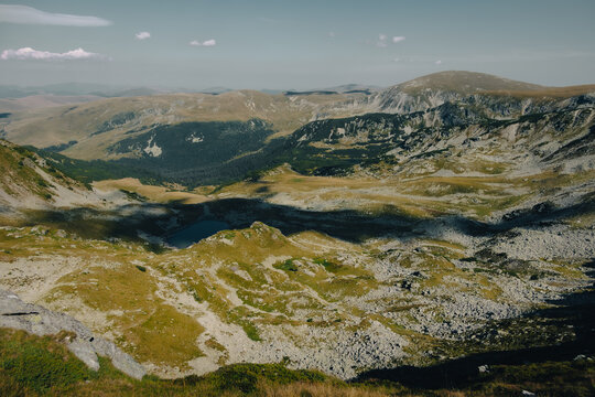 Endless mountain horizons and valleys seen from the top of Parang ridge.