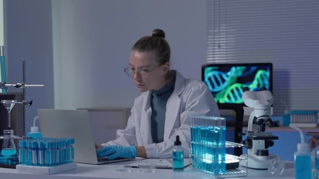 Female scientist analyzing dna samples in a laboratory