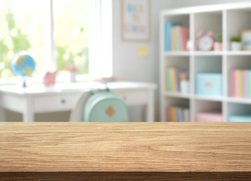 Back to school desk setup with globe and backpack in bright study room. Wooden desk surface sits before bookshelves and pastel supplies, creating neat scholastic display for learning.