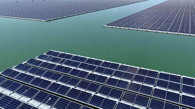 Floating solar photovoltaic panel array on water surface for clean energy generation