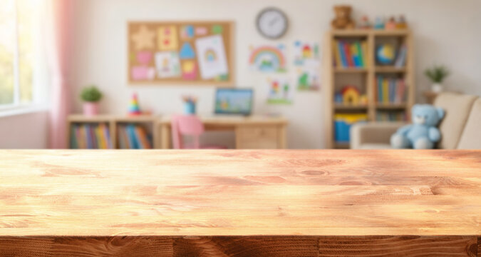 Empty wooden tabletop fronts child learning space, with bookshelves, desk, wall art, and teddy bear in soft blur. Bright classroom style room suggests child study area and playful learning mood.