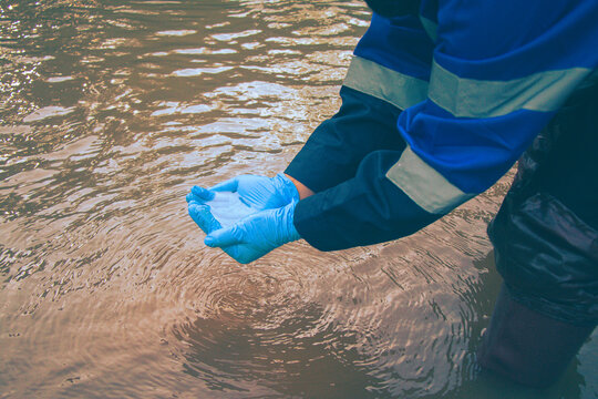 Water quality assessment through field sampling and laboratory analysis by environmental officials.