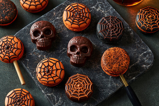 Premium candy display with artisan chocolates in a skull shape