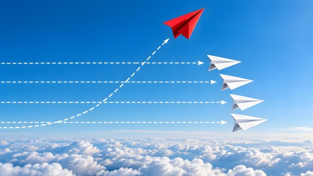 Red paper airplane changing direction and flying upwards breaking away from the group indicating innovation and unique strategy
