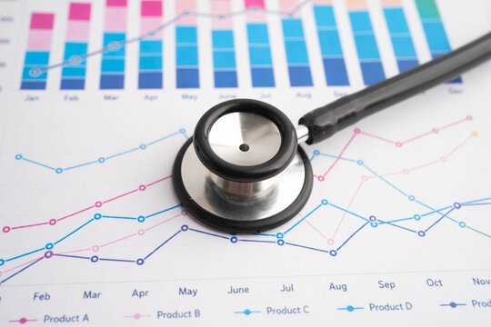 Stethoscope on chart or graph paper, Financial, account, statistics and business data medical health.