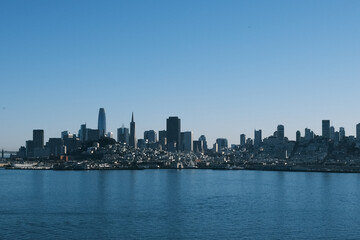 Fototapeta premium San Francisco Skyline Across Calm Blue Bay Water
