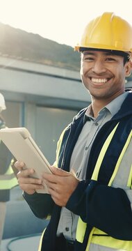 Construction worker, face and man with tablet, building site and laugh with research for renovation. Safety coordinator, portrait and happy person with digital report, online and inspection with tech