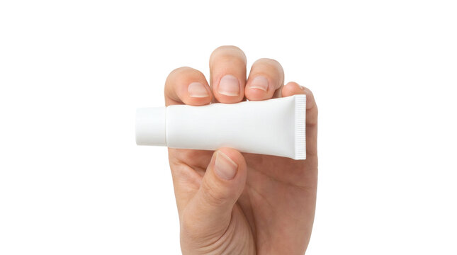 Closeup of human fingers holding a small blank white cosmetic squeeze tube for cream or gel mockup isolated on transparent background.