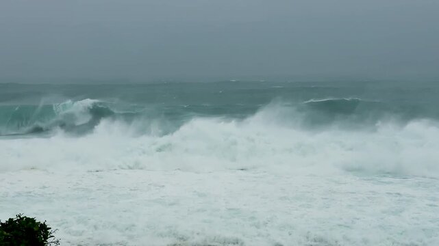 Powerful Storm Swells Break Along Tropical Coastline