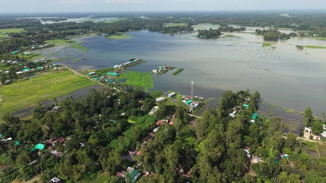 Aerial view of river flooding and inundated rural landscape in bangladesh drone