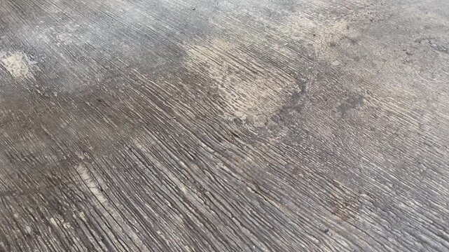 Rough concrete surface texture background with lined pattern