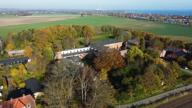 Tree-filled residential area and houses at Gammel Ega near Aarhus, Denmark, aerial