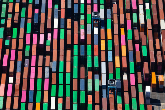 Aerial top down view of colorful shipping containers in a port