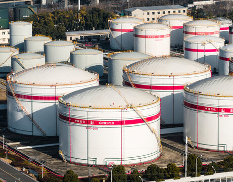 Aerial view of large white Sinopec oil storage tanks with red stripes. Industrial energy infrastructure and petroleum reserves facility. . Wuhan, China, 21 Feb 2026	