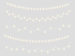 Obraz premium Warm Christmas garland featuring bright golden bulbs and tiny sparks. Curved strings create beautiful decorative borders. Transparent PNG set for seasonal artwork.