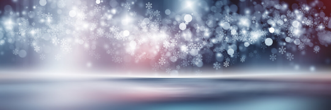 Blurred glitter effects background. Bright soft blue with hints of pearl color. Christmas background. Festive Christmas backdrop with holiday charm. Blurred bokeh light on dark blue background. Christ
