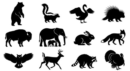 Obraz premium Collection of wild animal silhouettes including bear skunk swan porcupine buffalo elephant rabbit fox owl deer raccoon and turkey for nature design projects