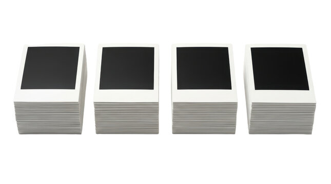 Four neat stacks of instant film photos isolated on transparent background