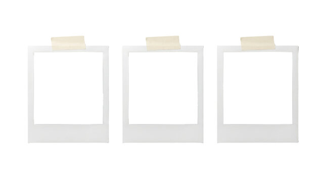 Three blank instant photo frames with adhesive tape isolated on transparent background