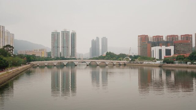 Lek Yuen Bridge, an arched pedestrian footbridge crossing the Shing Mun River in Sha Tin, Hong Kong, built in 1988 and connecting the northern and southern banks of the river channel 