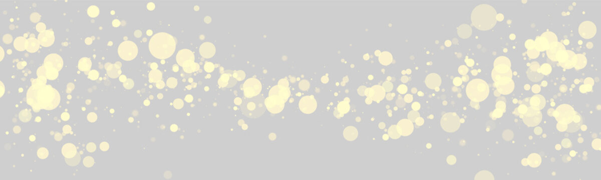Floating golden bokeh lights create a sparkling horizontal wave across a black background. The circles vary in size with a soft glowing effect and scattered dense arrangement.