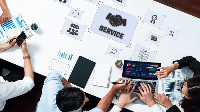 A collaborative business meeting in progress with a focus on service concepts, technology devices, data analysis, and team interaction showcasing effective teamwork. Raster