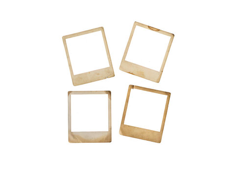 Four vintage empty polaroid photo frames isolated on transparent background