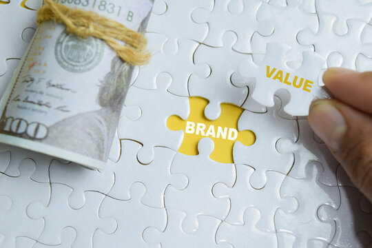 Piece of jigsaw puzzle brand value phrase. For identity and commercial worth
