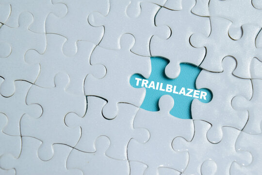 Piece of jigsaw puzzle trailblazer phrase. For leadership, innovation and pioneering ideas