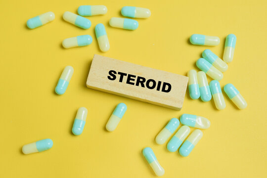 Concept of steroid text on wooden blocks.