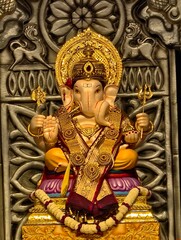 Fototapeta premium 14 September 2026, Pune, Maharashtra, India, Beautiful sculpture of Lord Ganesh called as Tambdi Jogeshwari Ganpati near ABC chowk, Pune, during Ganesh Utsav Festival 2026.