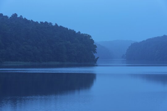 Dawn at blue hour at the lake, Schmalen Luzin, Feldberger Seenlandschaft, Mecklenburg-Western Pomerania, Germany