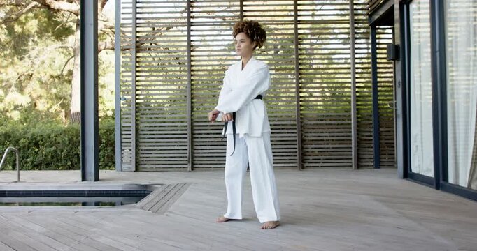 Lifestyle videos Outdoor of people doing activities, Practicing martial arts, woman in karate unifor