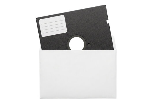 Retro Five Quarter Inch Floppy Disk Emerging From White Paper Sleeve