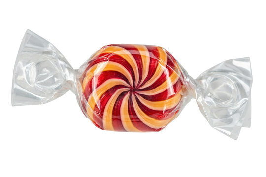 Round hard candy with red and yellow swirls wrapped in clear transparent plastic isolated on a transparent background