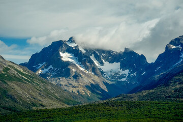Fototapeta premium Snow-Capped Patagonian Mountain Peaks Above Ushuaia Valley