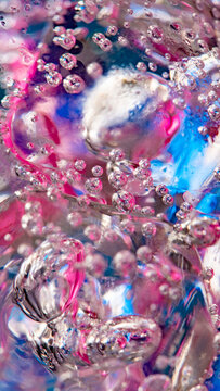 Bubbles in liquid creating abstract colorful texture background