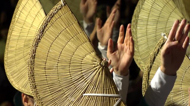 TOKYO, JAPAN - AUG 2026 : Slow motion shot of Awa Odori dance festival in Koenji. Powerful and energetic dance and music. Traditional Japanese summer event in Tokyo. Close up shot of lady dancer.