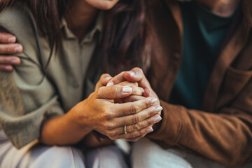Fototapeta premium Couple Holding Hands Showing Love, Support and Comfort During Intimate Moment Together