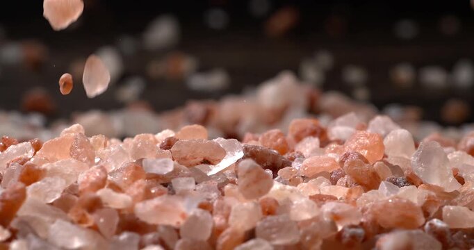 Himalayan pink salt in a super slow motion, natural mineral seasoning for healthy cooking and spa concepts. Super slow motion 1500 fps.