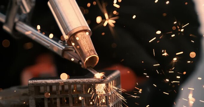 Laser welding machine. Shot on super slow motion camera 1000 fps. Laser welding is shown in close-up