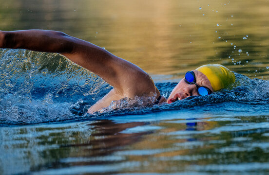 White swimmer performing freestyle stroke