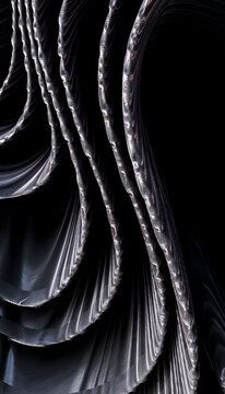 Close-up of shiny metal chains with connected loops