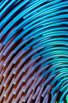Curved blue rods form an abstract geometric pattern